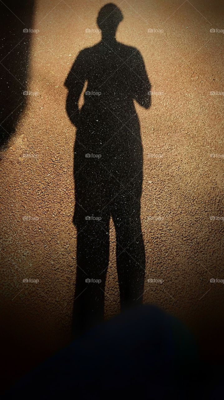 Shadow of a standing person