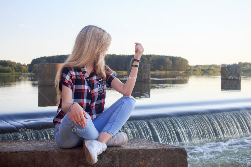 girl near the waterfall