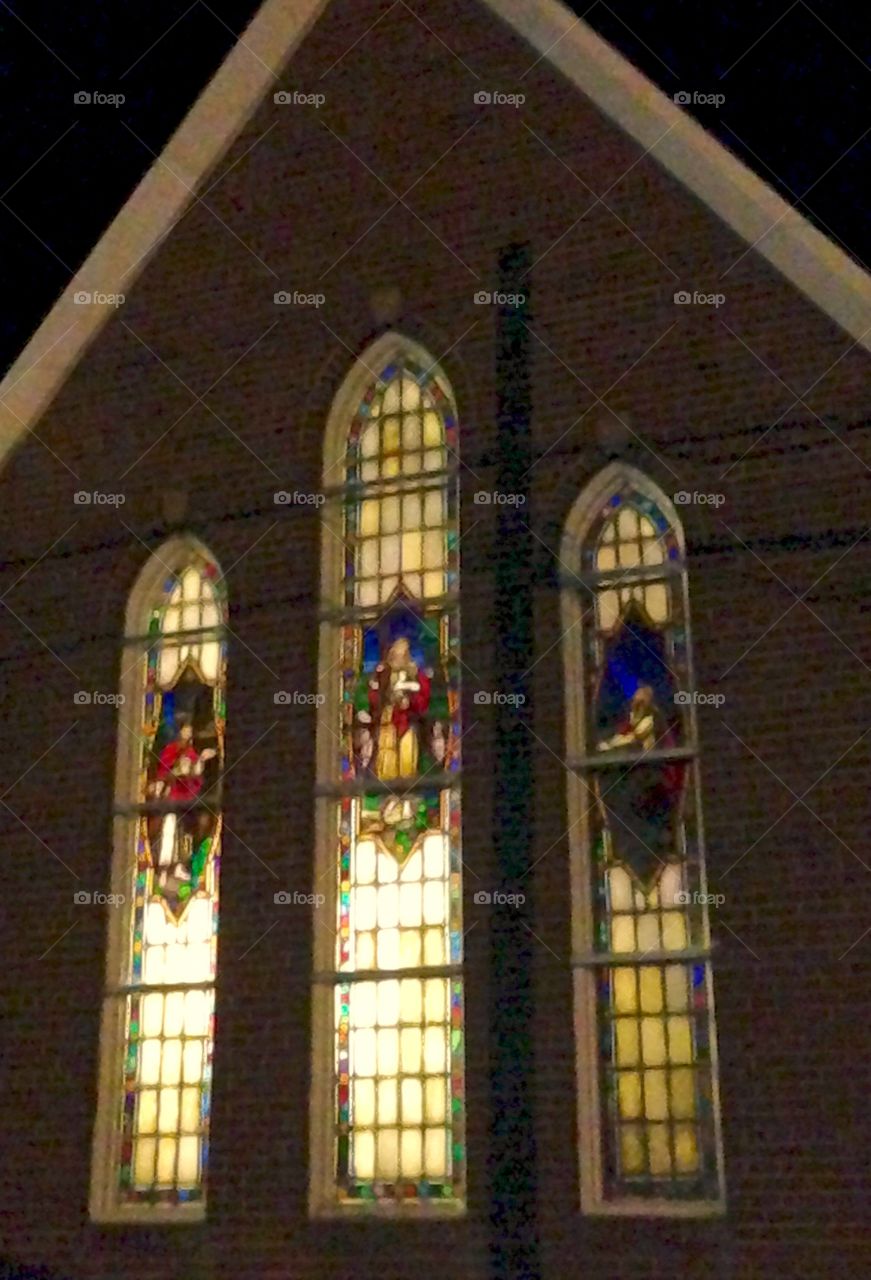Stained Glass. The ending of DST revealed the beauty of this church at night. A shadow creates the illusion of a cross. 