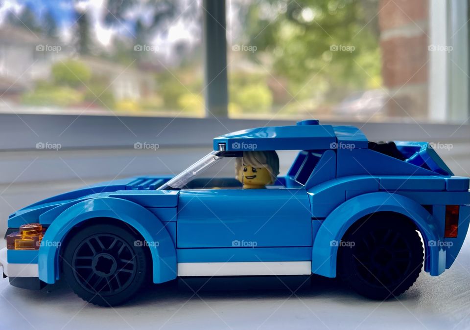 A Lego car looks sporty and is fun to assemble, collecting pieces can be a hobby for all ages