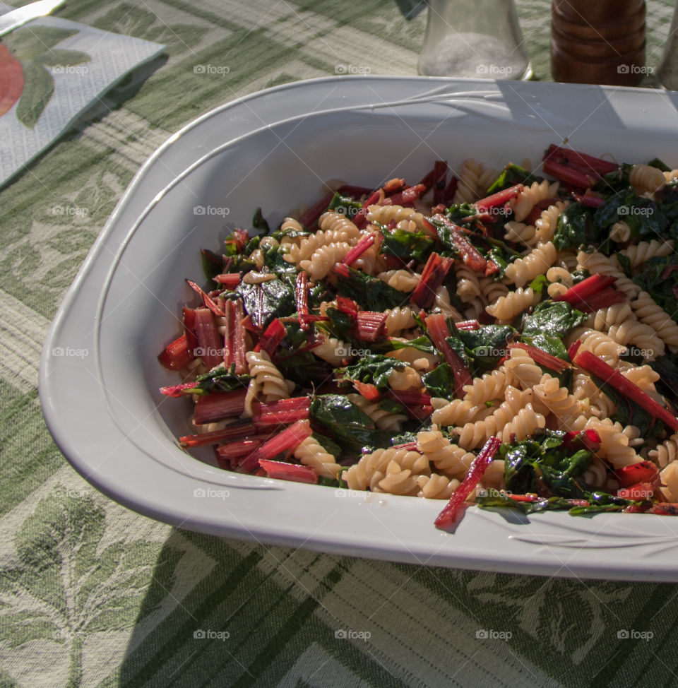 High angle view of pasta with salad