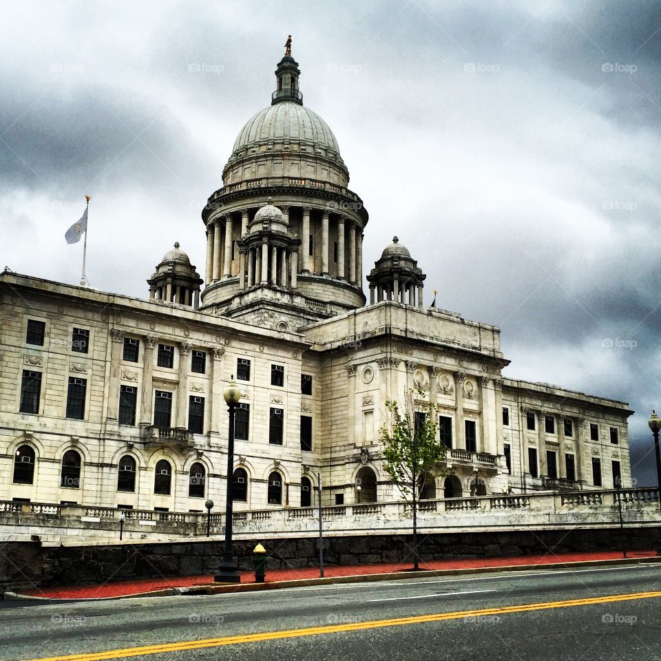 Clouded state. Rhode Island State House on a gray cloudy day.