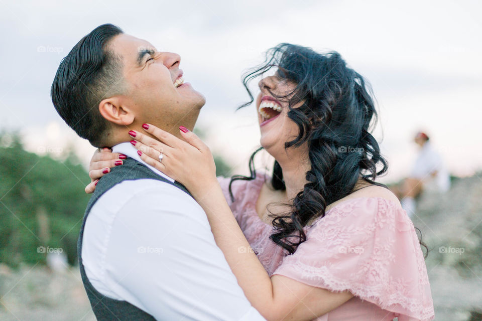 Candid of a couple laughing and having a good time