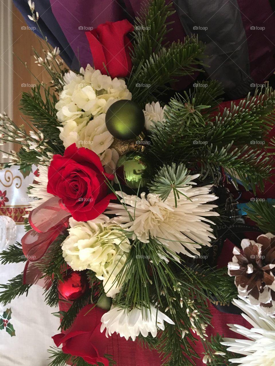 Christmas decorations Christmas greens pine princess pine, red roses red bows white hydrangeas