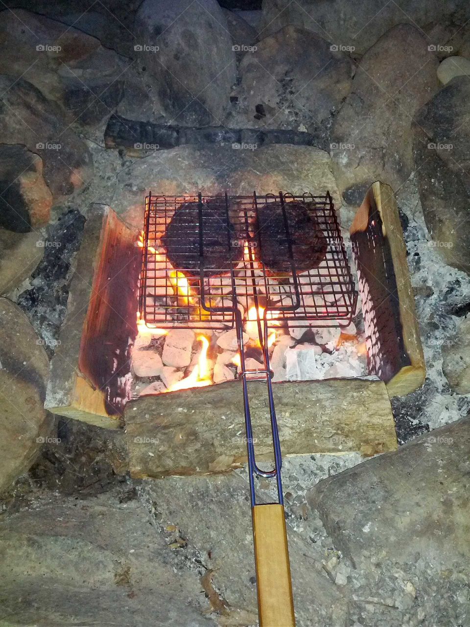 Steaks over the fire pit