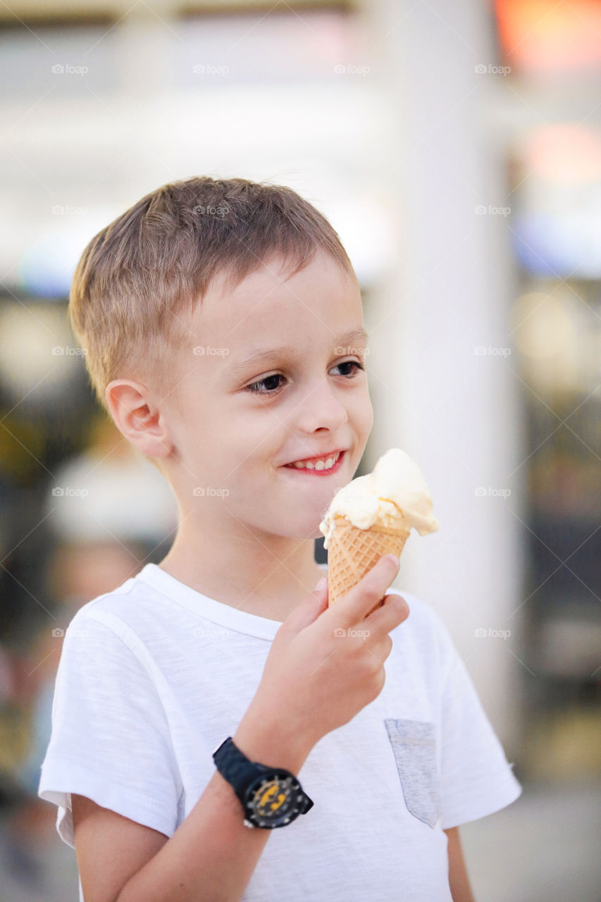 Boy eating ice cream 