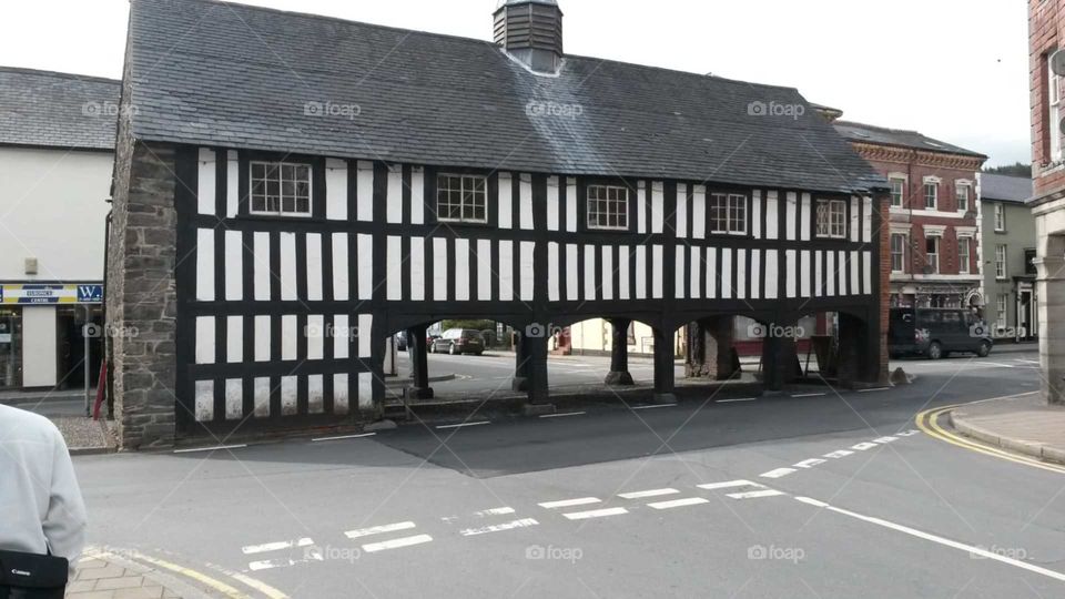 The Old Market Hall in Llanidloes is actually a museum in the middle of the town at a crossroads