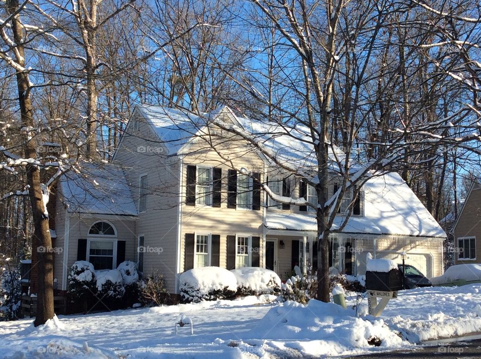 Snow on a house in Virginia