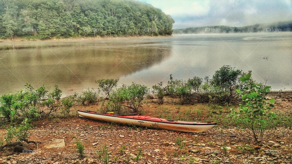 Kayak on the shore.
