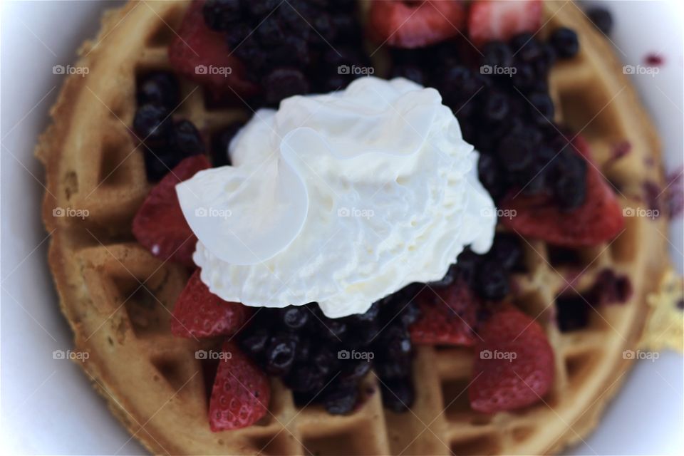 Waffle with strawberry and cream 
