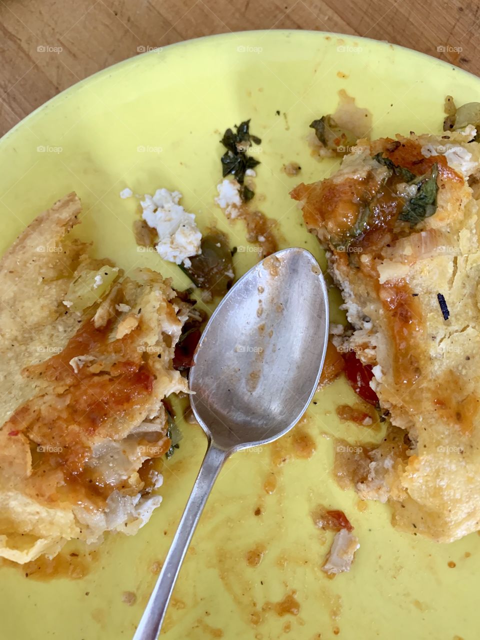 Taco split in two with spoon