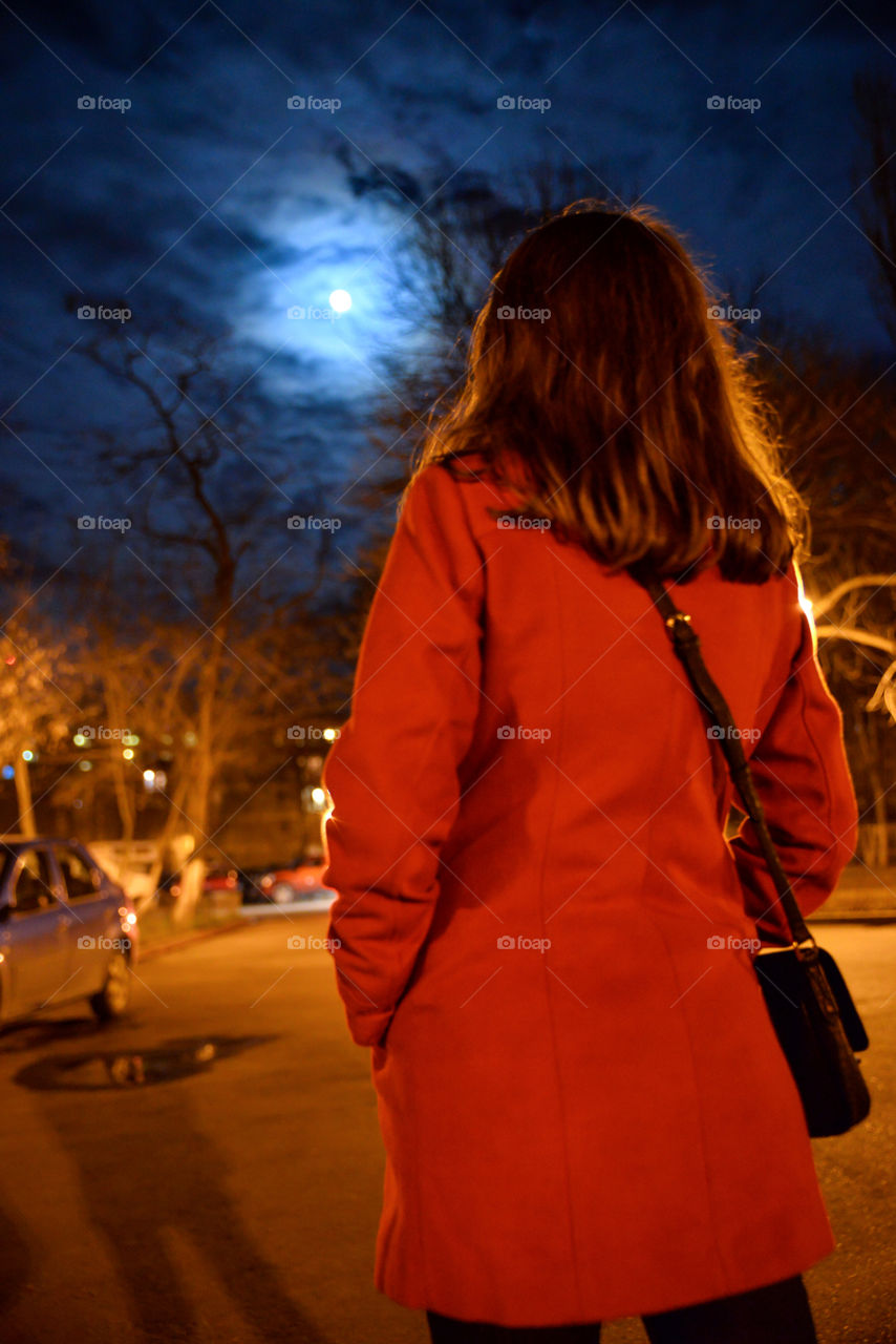 Looking at the moon. girl looking at the moon