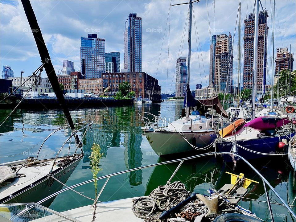 This is „Newtown Creek“ by the „Pulaski Bridge“ in LIC. Many different kinds of boats are tied to the shore here and the best views one can experience from aboard one of them such as in this case from aboard „Salvation“. 2023. Hypnotic Productions