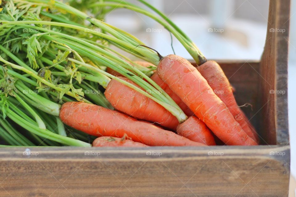 Carrots in wooden box