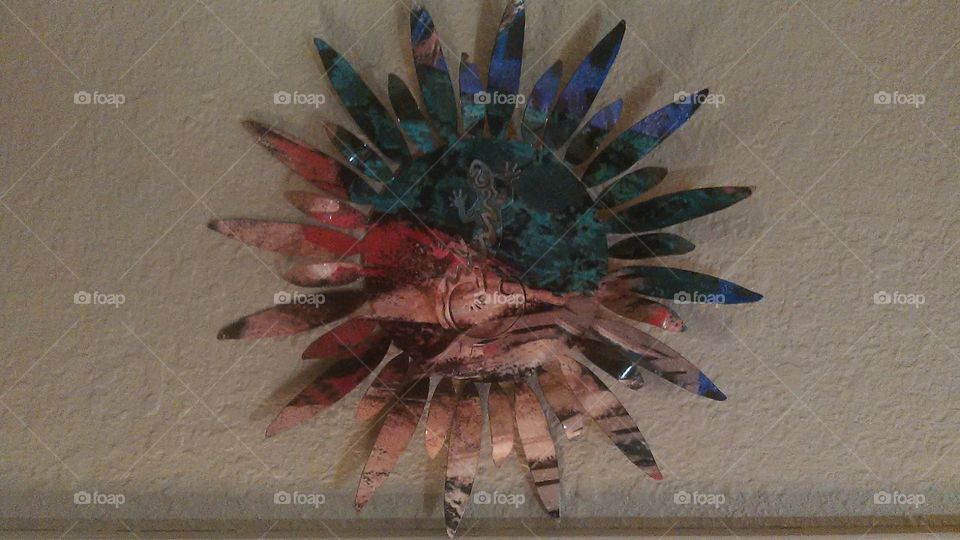 woodstock lizard. clock with a lizard that is camofluaged