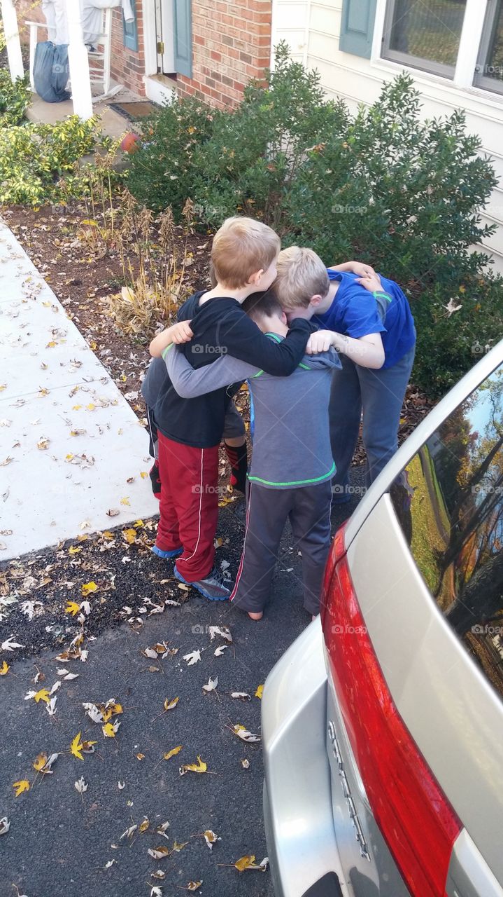 the huddle. best buds saying goodbye until next time