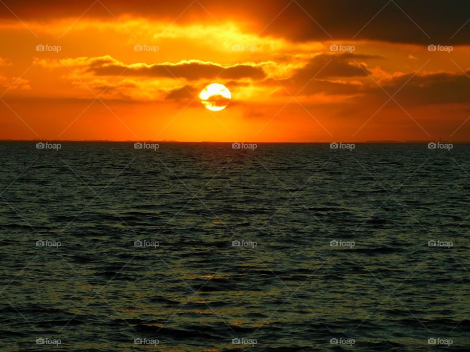 Idyllic view of sea during sunset