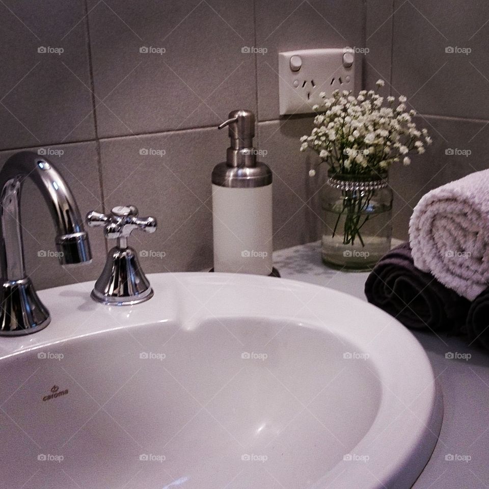 Bathroom Bling . Fresh flowers and diamonds for a touch of bathroom elegance. 