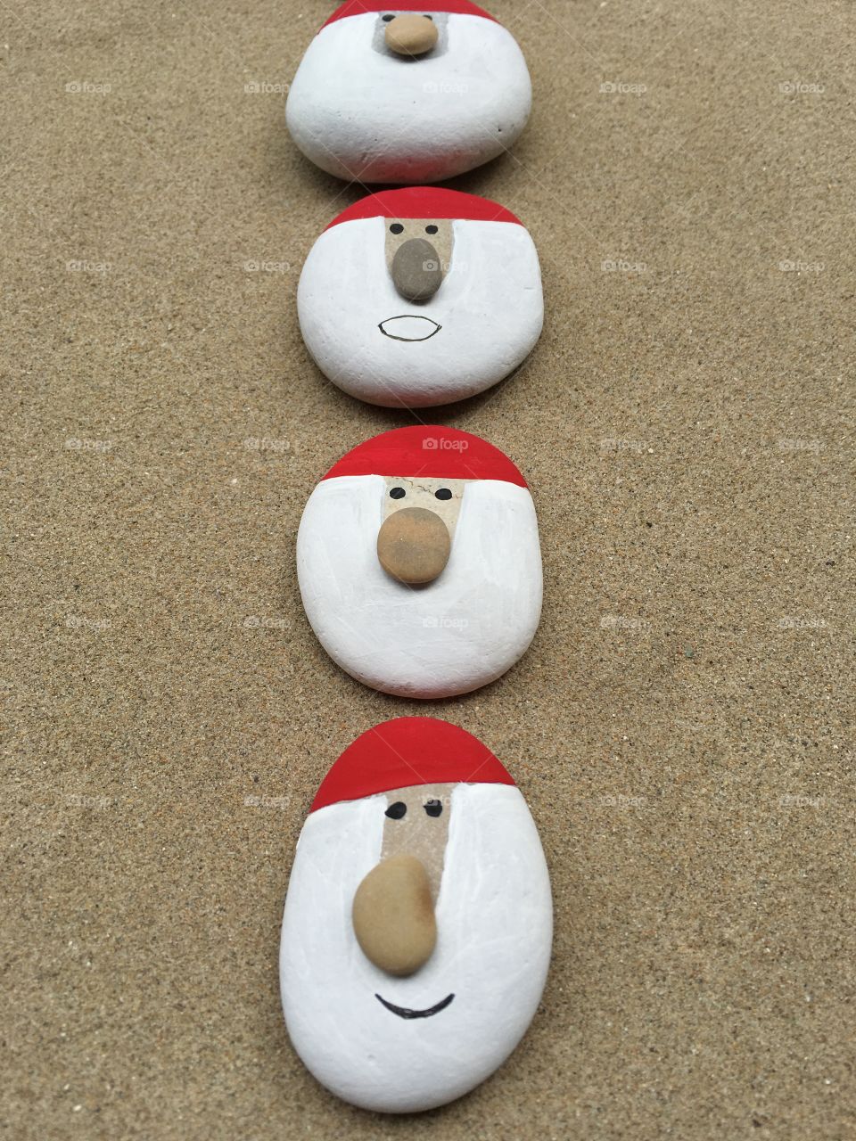 Souvenir of Christmas with many Santa Claus heads design