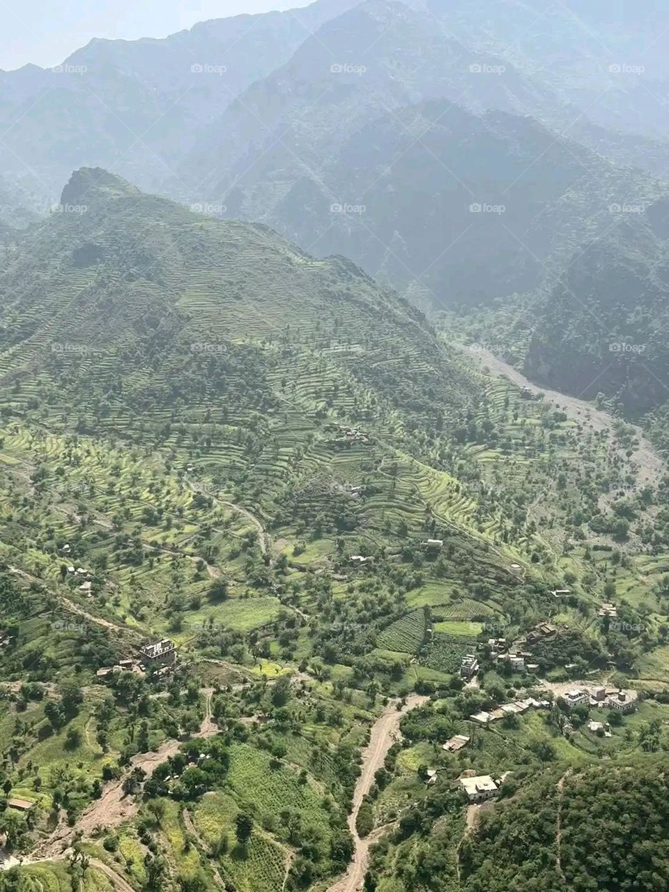 Glory be to God, the magnificent and picturesque view and the natural green trees are a view that is nothing more wonderful than it