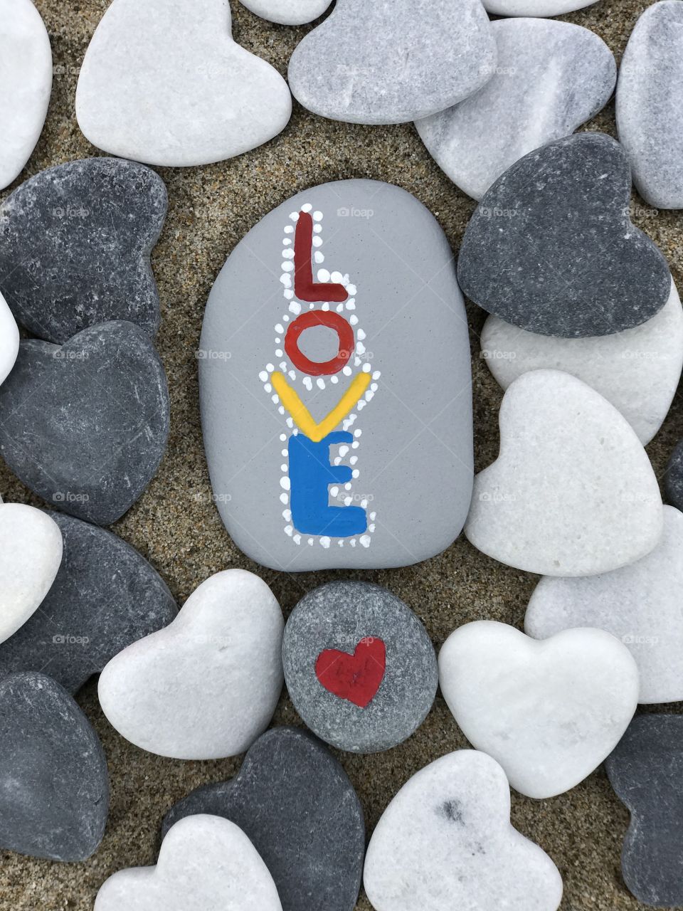 Love written on the pebble stone