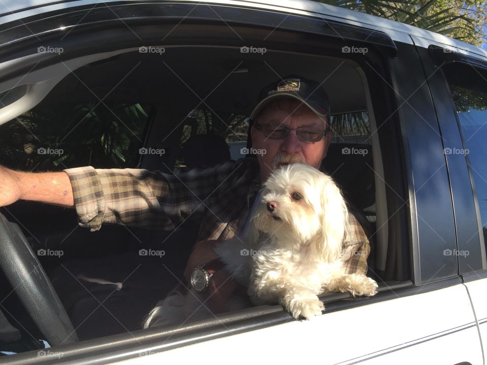  Lalita, enjoying the sun with one of her owners, Cliff. She loves riding, we have been on cross country trips with her.