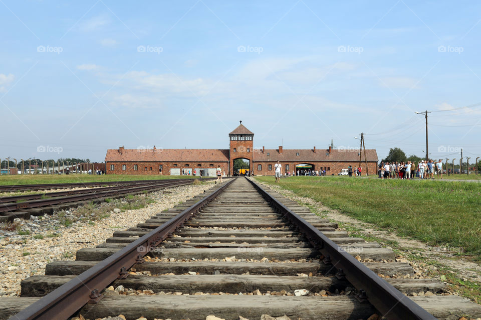 View along the railway tracks inside the Nazi concentration camp of Auschwitz Birkenau