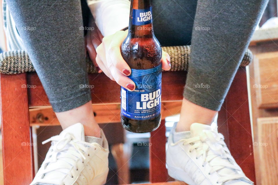 Bud Light - holding your Bud.