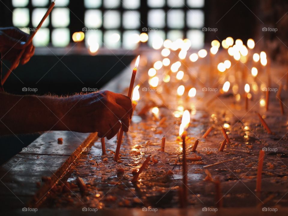 Person holding candle