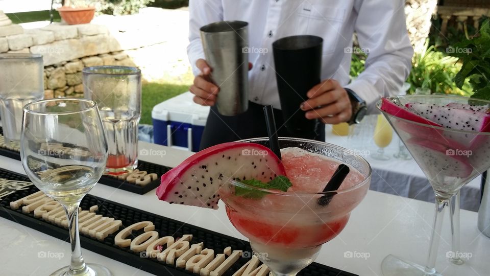 mixing cocktails at a wedding