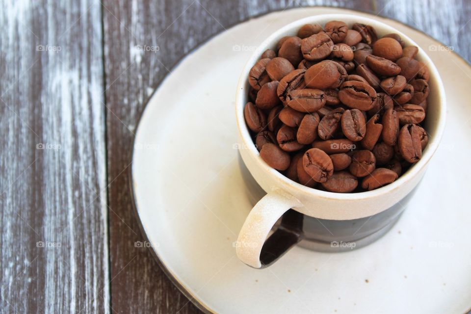 Coffee beans in the cup