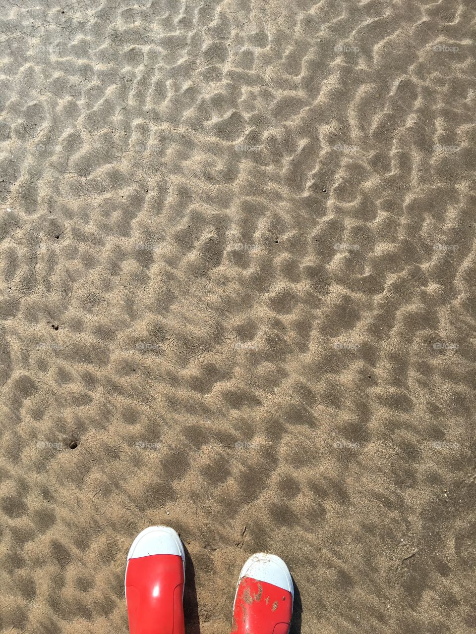 A relaxing walk on the beach looking at beautiful, natural patterns in the sand. 