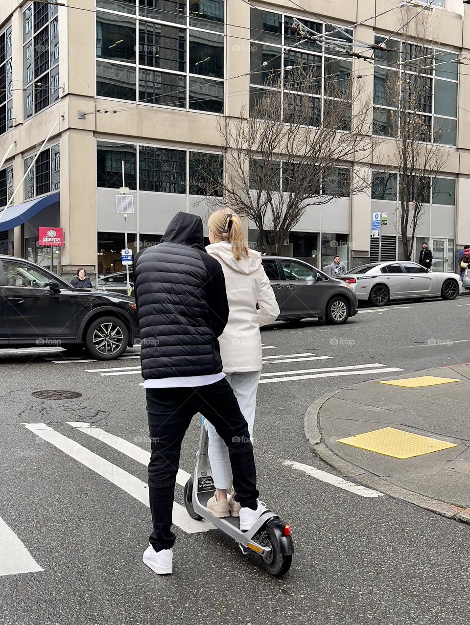 Couple on the electric scooter 