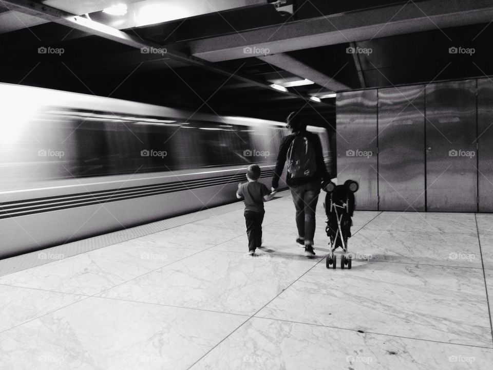 Woman and child in subway station