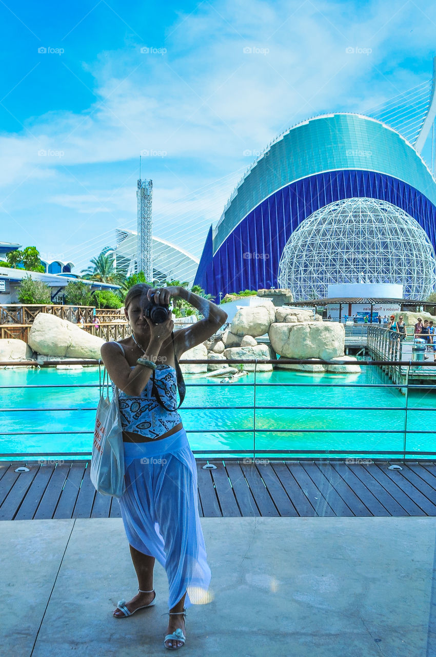 Girl making selfie in oceanography museum in Valencia 