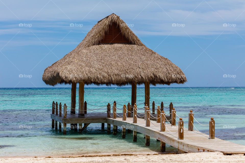 Caribbean beach, small pier with hut
