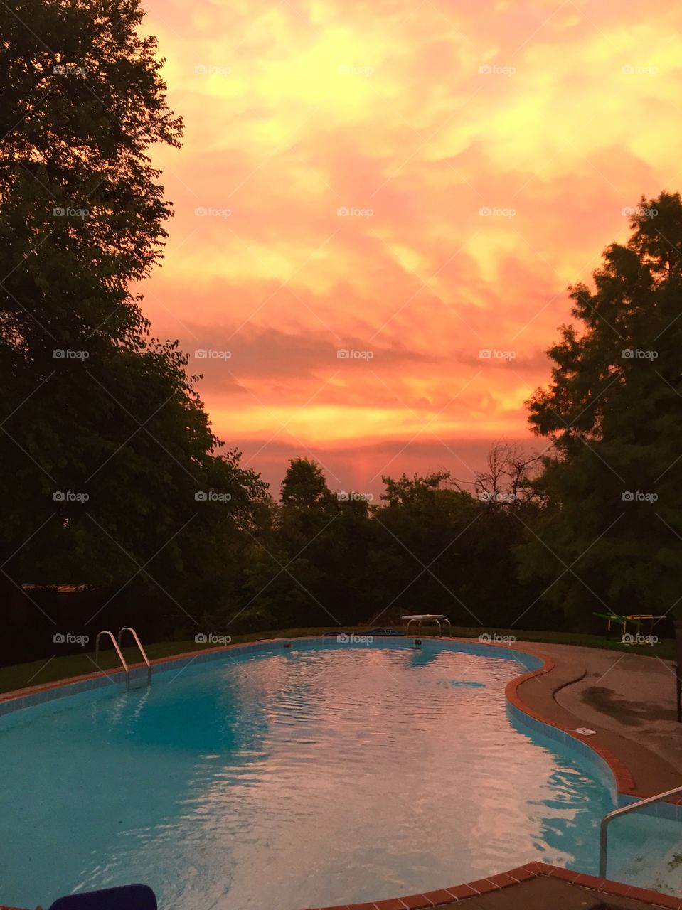 Sunset by the pool