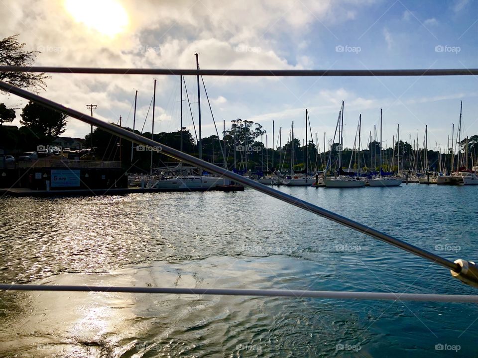 Sailboats at sunset in Santa Cruz Harbor
