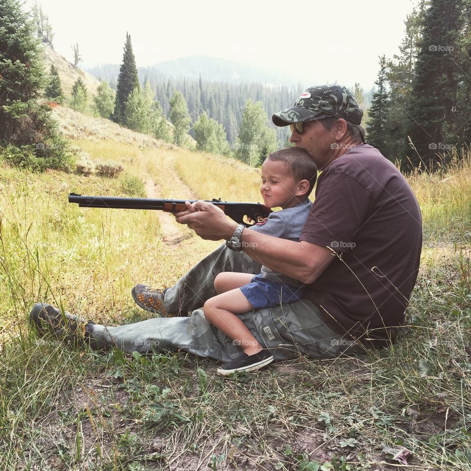 Teaching to shoot. My dad got my son a Red Ryder BB gun