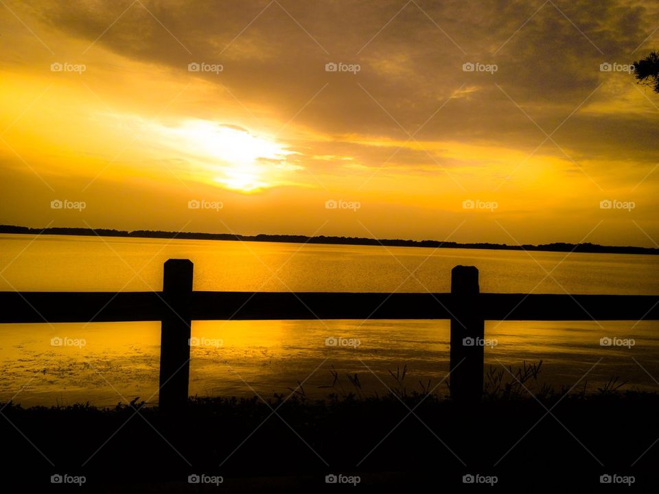 Sun beyond the fence