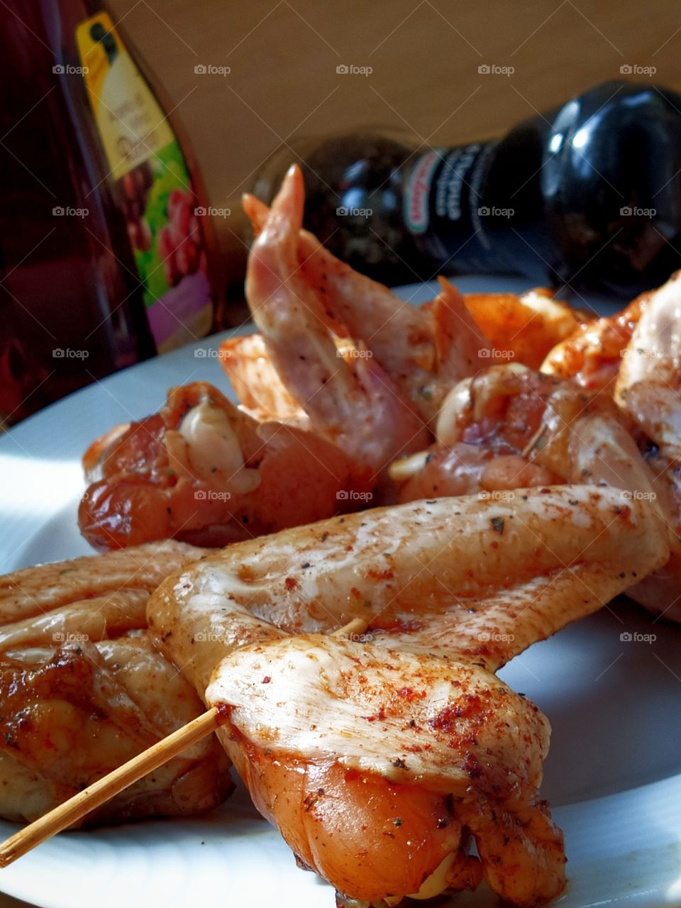 Spiced chicken wings on skewers