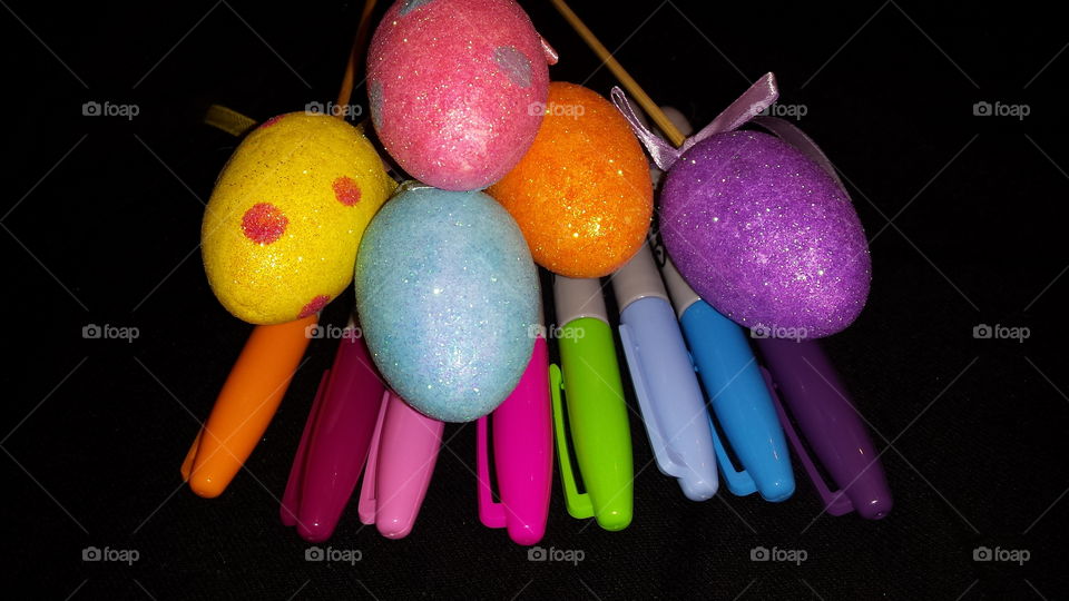 colorful pens and eggs