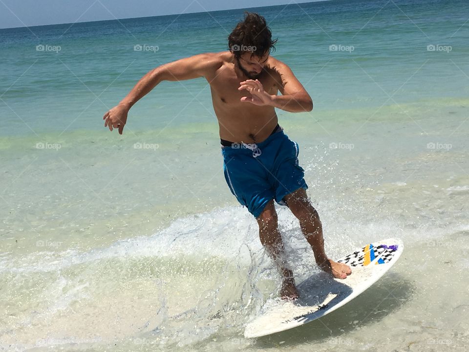 Surfer skim