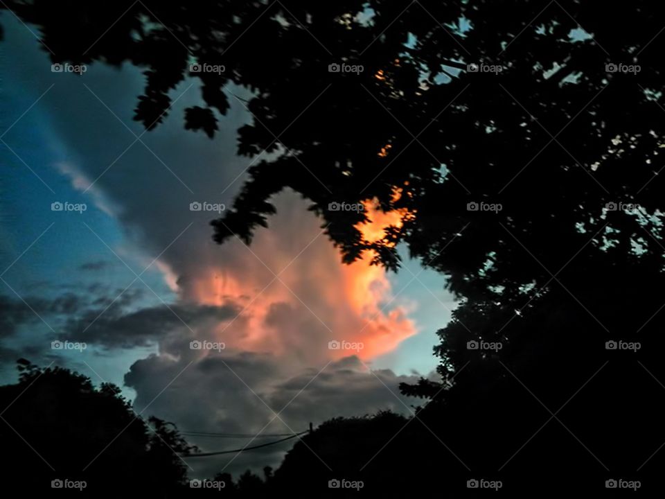 black dark sunset clouds by EthaNox
