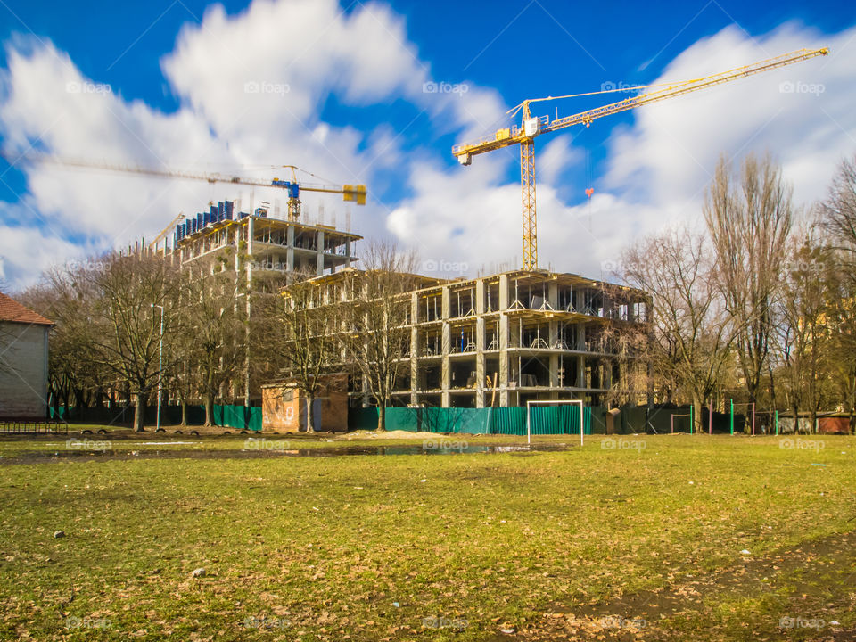 building process with crane on long exposure