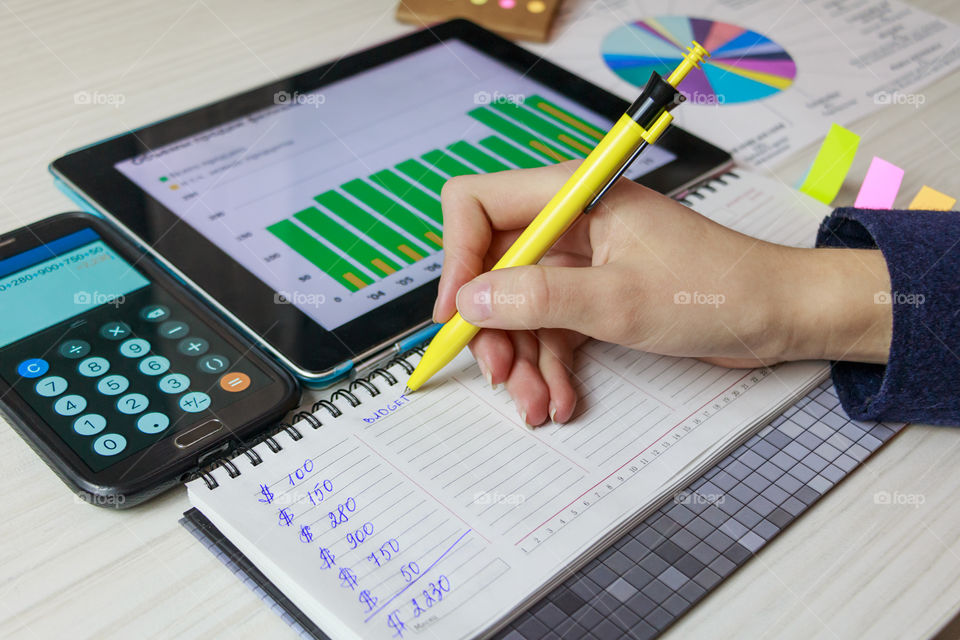 student doing homework on the economy