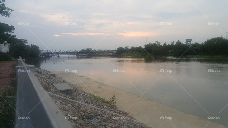 view of riverside sunset from thailand