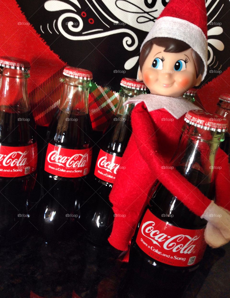 The Elf on the Shelf loves Coca-Cola!