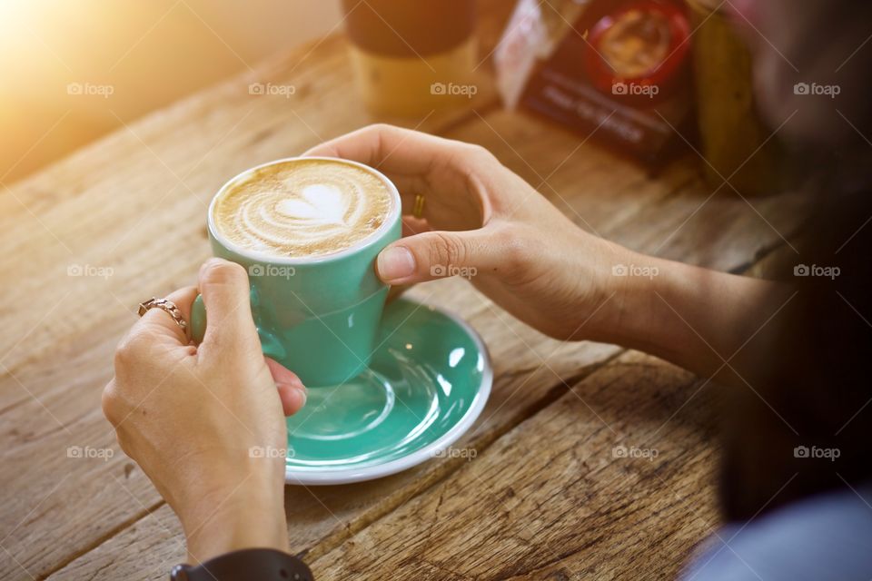 Women drinking coffee cup 