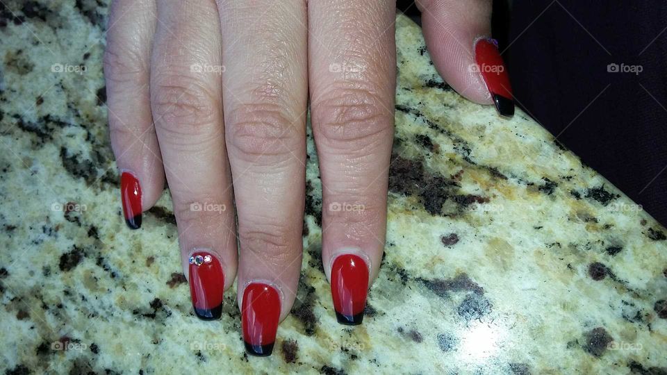 My red nails with black tips.